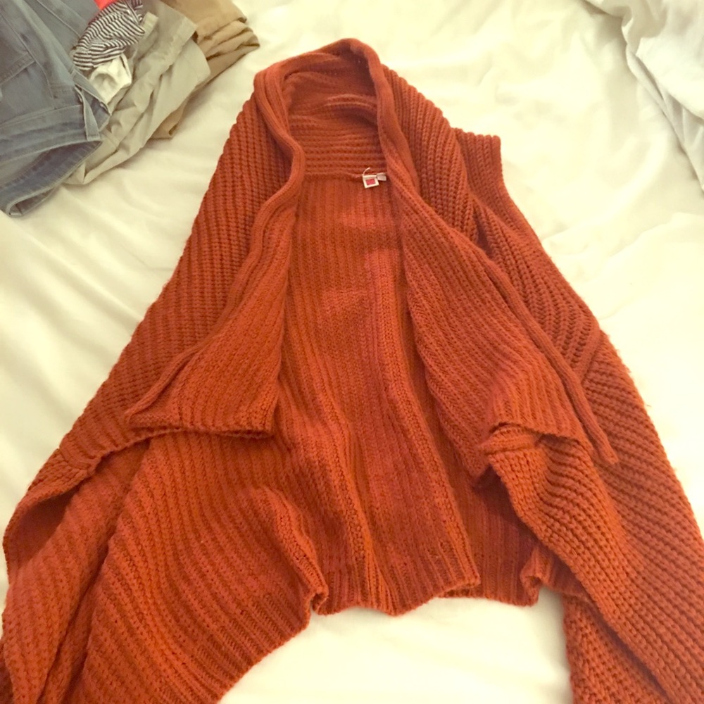 Beautiful wrap/ sleeveless sweater